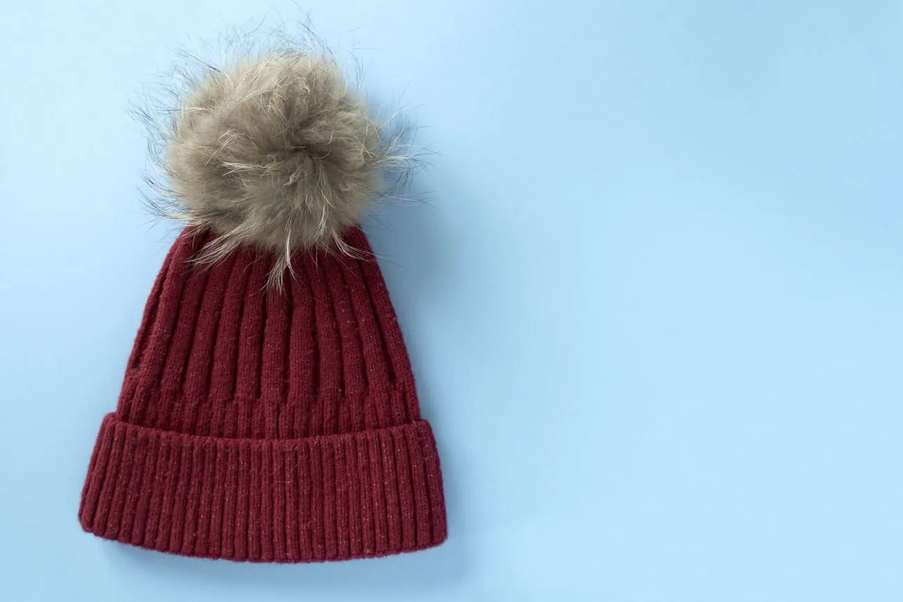 A hat with a fluffy pom-pom.jpg?format=webp
